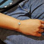Nosotros foto modelo pulsera plata smile azul